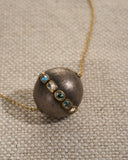 GOODMAN MORRIS, SILVER GLOBE PENDANT